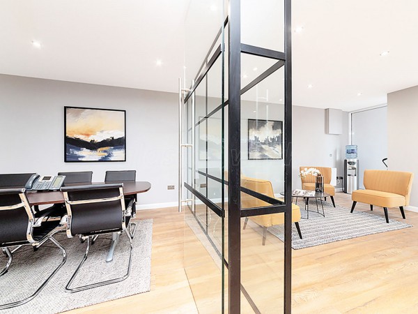 Madison Brook (Royal Victoria Dock, London): Panelled Glazed Industrial-Style Glass Corner Room