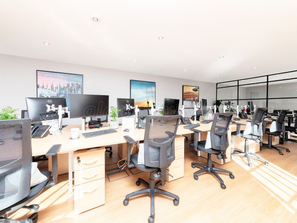 Madison Brook (Royal Victoria Dock, London): Panelled Glazed Industrial-Style Glass Corner Room