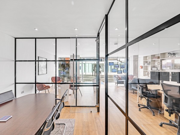 Madison Brook (Royal Victoria Dock, London): Panelled Glazed Industrial-Style Glass Corner Room