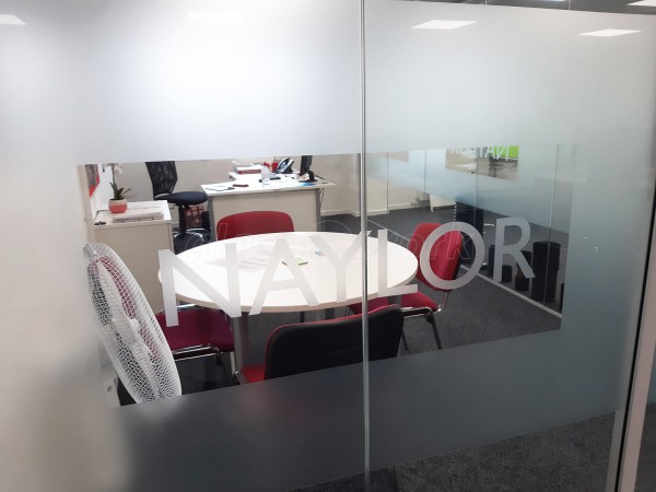 Naylor Industries Plc (Barnsley, South Yorkshire): Acoustic Glass Corner Office With Window Film Logo