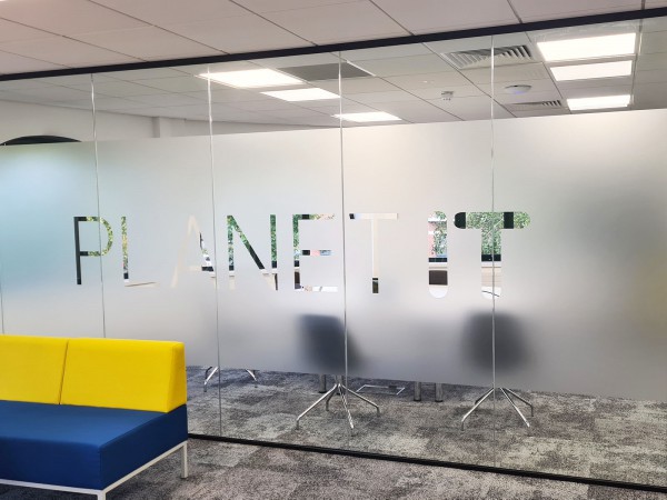 Planet IT (Abingdon, Oxfordshire): Glass Corner Room With Soundproofed Glazing and Bespoke Window Film Graphics