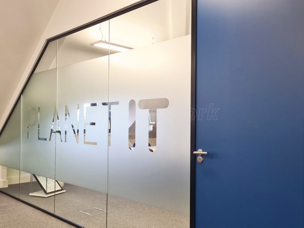 Planet IT (Abingdon, Oxfordshire): Glass Corner Room With Soundproofed Glazing and Bespoke Window Film Graphics