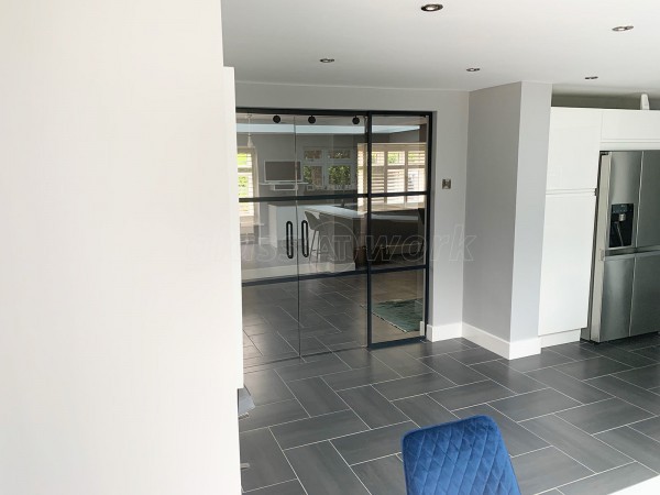 Domestic Project (Ampthill, Bedfordshire): Slimline T-Bar Black Framed Glazing With Frameless Glass Sliding Doors