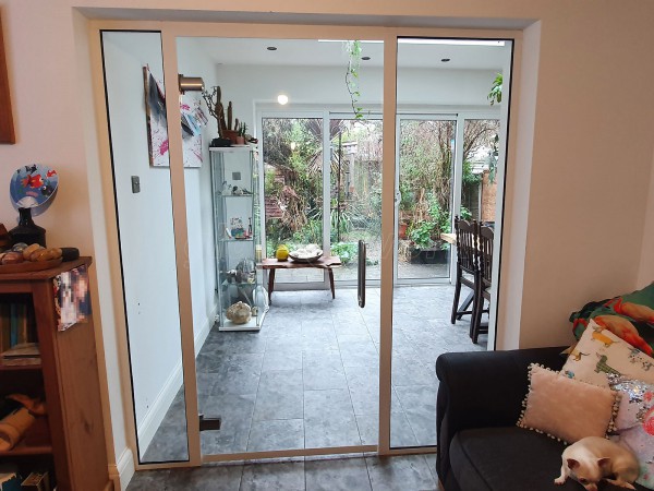 Domestic Project (Greenford, London): Toughened Glass Partition Wall and Door With White Frame