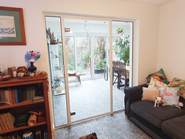 Domestic Project (Greenford, London): Toughened Glass Partition Wall and Door With White Frame