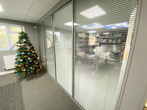 Cooper and Kelling Builders (Halstead, Essex): Glass Office Wall With Built-in Venetian Blinds.