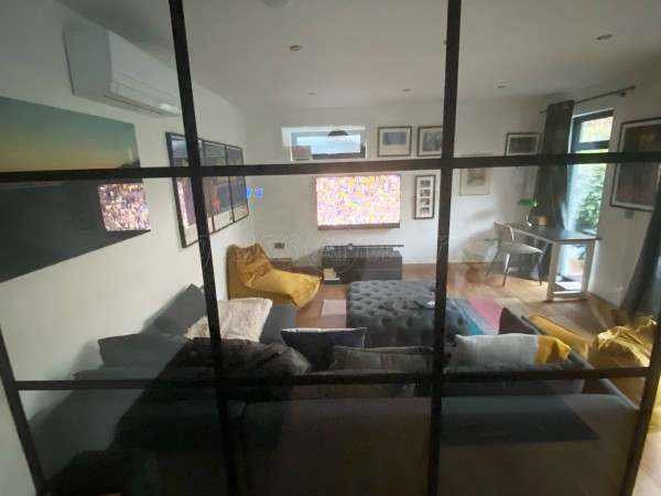 Domestic Project (Wandsworth, London): T-Bar Glass Room Divider Using Black Metal Framework