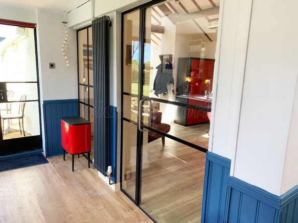 Residential Project (Pwllheli, Wales): T-Bar Black Framed Glass Door and Side Panel