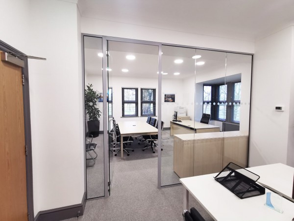 FSG Property Services (Milton Keynes, Buckinghamshire): Large Shaped Glazed Screen With Transom and Glass Office Fit-out