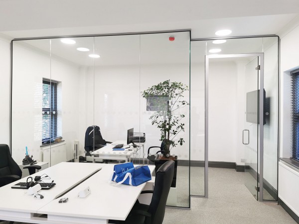 FSG Property Services (Milton Keynes, Buckinghamshire): Large Shaped Glazed Screen With Transom and Glass Office Fit-out