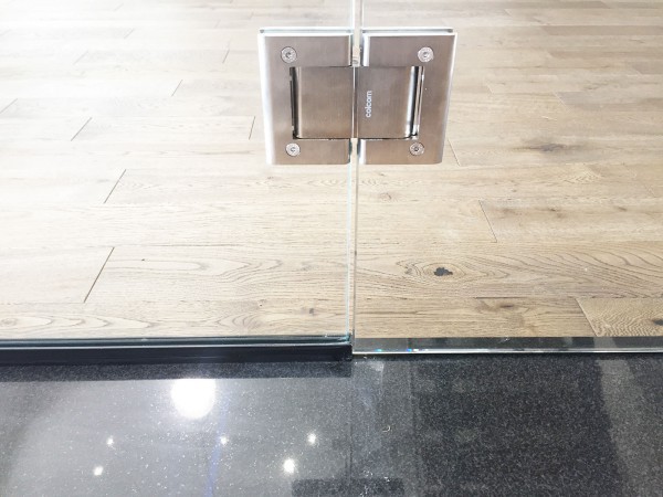 Westbase Technology Ltd (Caldicot, Monmouthshire): Frameless Glass Corner Room with glass-to-glass door hinges