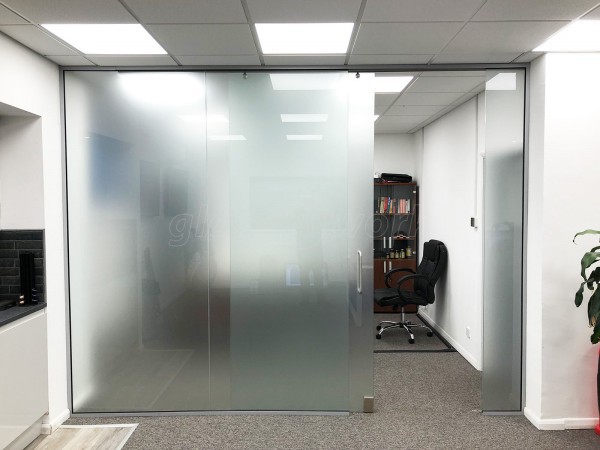 Unified Retail Group (Huntingdon, Cambridgeshire): Top Hung Sliding Glass Door, With Full Window Film