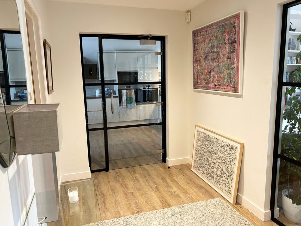 Domestic Project (Seaford, East Sussex): T-Bar Aluminium Black Framed Glass Doors