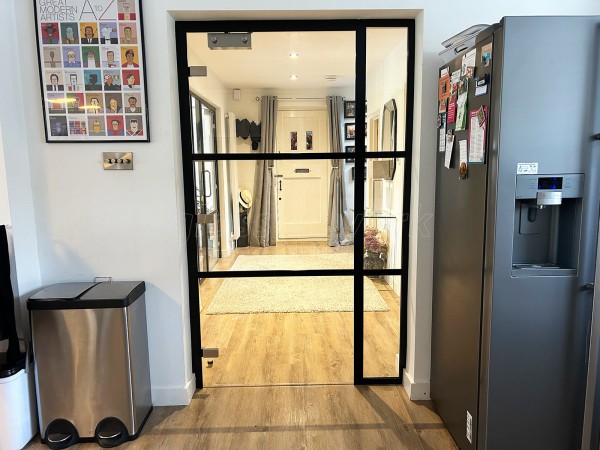 Domestic Project (Seaford, East Sussex): T-Bar Aluminium Black Framed Glass Doors