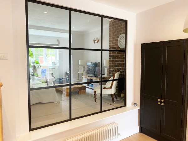 Domestic Project (Haslemere, West Sussex): Black Metal and Glass Grid Glazed Wall Using Our T-Bar System