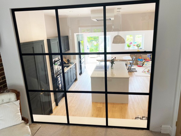 Domestic Project (Haslemere, West Sussex): Black Metal and Glass Grid Glazed Wall Using Our T-Bar System