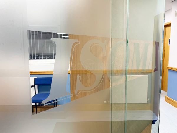 Isoma Limited (Swadlincote, Derbyshire): Laminated Acoustic Glass Corner Room With Logo