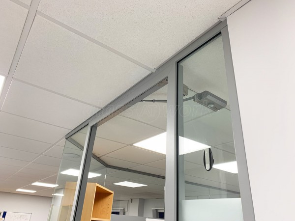 Isoma Limited (Swadlincote, Derbyshire): Laminated Acoustic Glass Corner Room With Logo