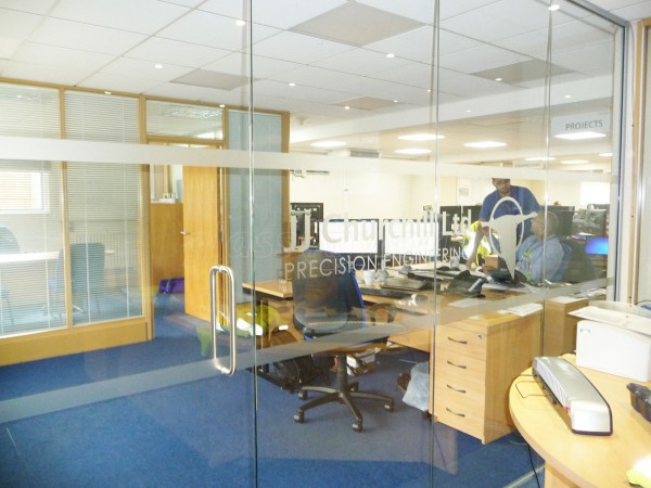 J J Churchill (Nuneaton, Leicestershire): Toughened Glass Office Partition With Bespoke Window Film