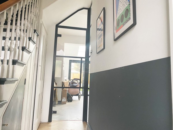 Residential Project (Aldersbrook, London): T-Bar Black Framed Glass Corner Wall and Door Using Acoustic Glass