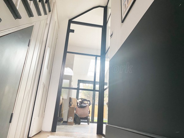 Residential Project (Aldersbrook, London): T-Bar Black Framed Glass Corner Wall and Door Using Acoustic Glass