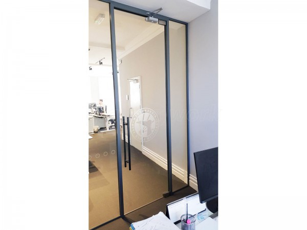 Blacks Visual Merchandising Ltd (Mayfair, London): Laminated Acoustic Glass With Framed Door [Basalt grey RAL 7012]