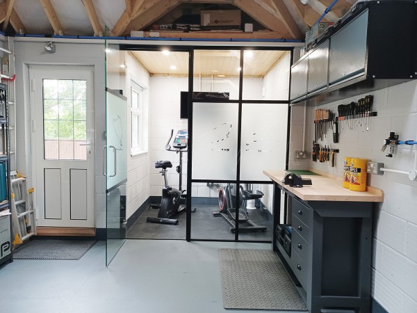 Domestic Garage (Chelmsford, Essex): T-Bar Black Framed Metal and Glass Wall For a Garage / Workshop / Home Gym