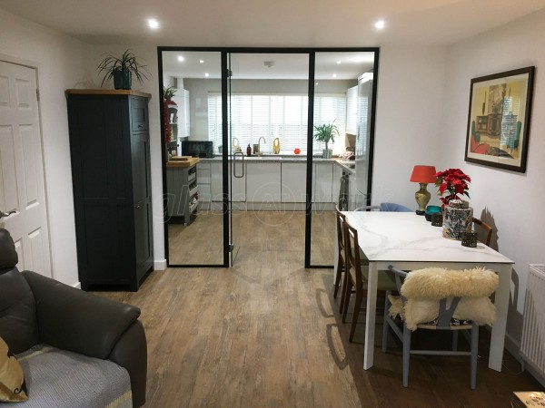 Domestic Project (Norwich, Norfolk): Glass Wall and Door With Black Metal Frame