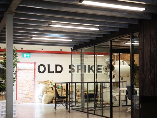 OLD SPIKE (Peckham, London): Acoustic Glass Corner Room With Vertical Black Trims & Black Frame